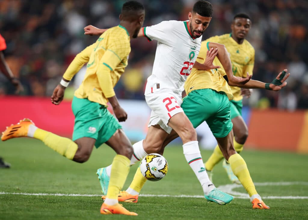 Mothobi Mvala - Age, salary, place of birth, wife, car 2 Tarik Tissoudali of Morocco challenged by Mothobi Mvala of South Africa during the 2023 Africa Cup of Nations Qualifiers